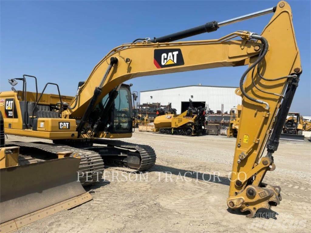CAT 323 Гусеничні екскаватори