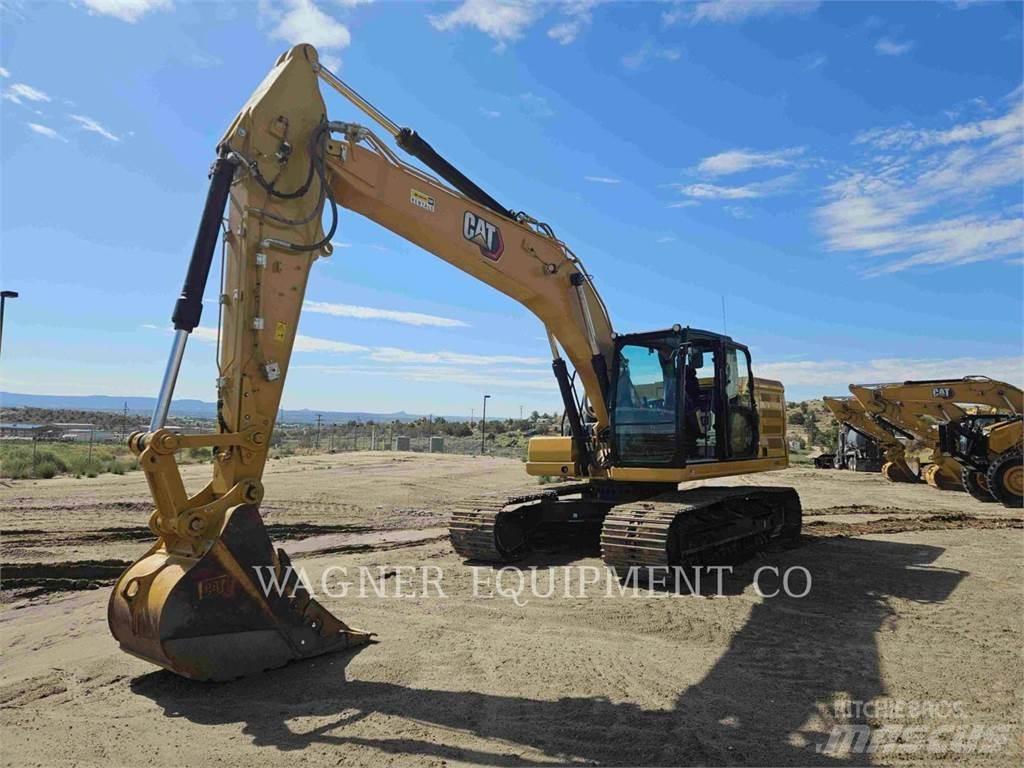 CAT 323 Гусеничні екскаватори