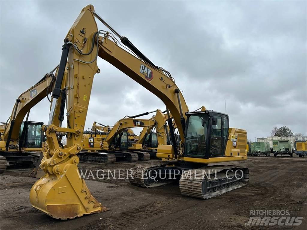 CAT 323 Гусеничні екскаватори