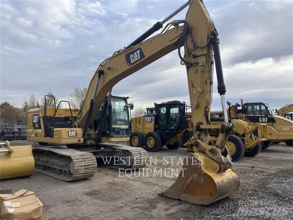CAT 323 Гусеничні екскаватори