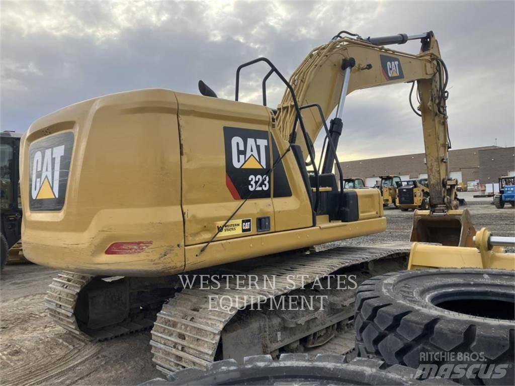 CAT 323 Гусеничні екскаватори