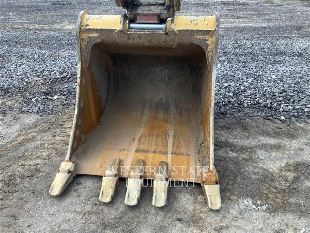 CAT 323 Гусеничні екскаватори