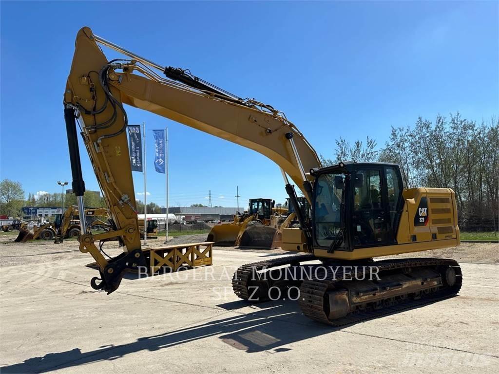 CAT 323 Гусеничні екскаватори