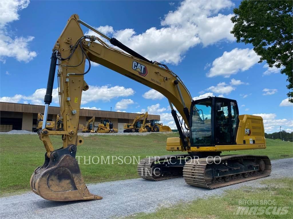 CAT 323 Гусеничні екскаватори