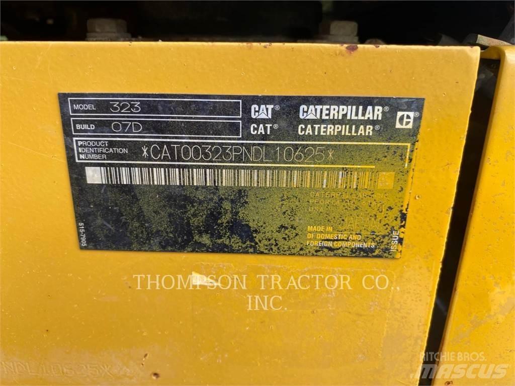 CAT 323 Гусеничні екскаватори
