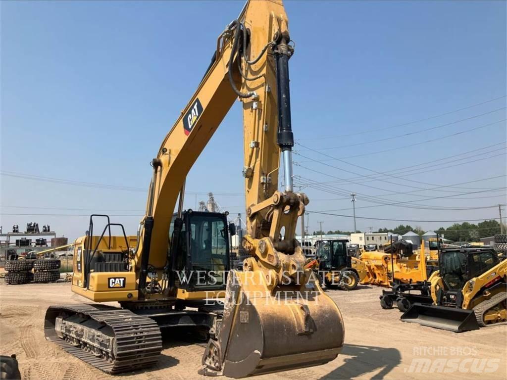 CAT 323 Гусеничні екскаватори