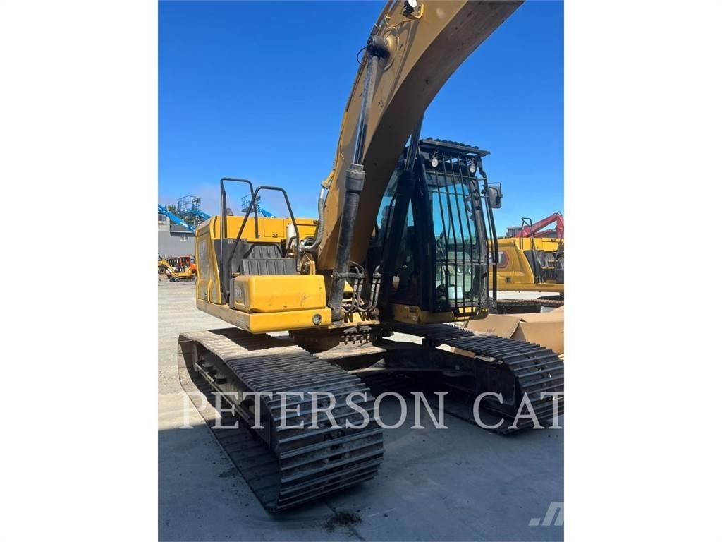CAT 323 Гусеничні екскаватори