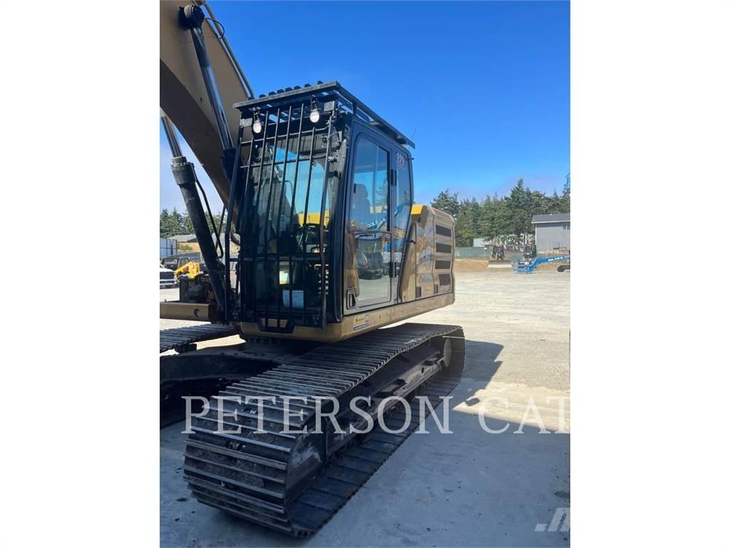 CAT 323 Гусеничні екскаватори