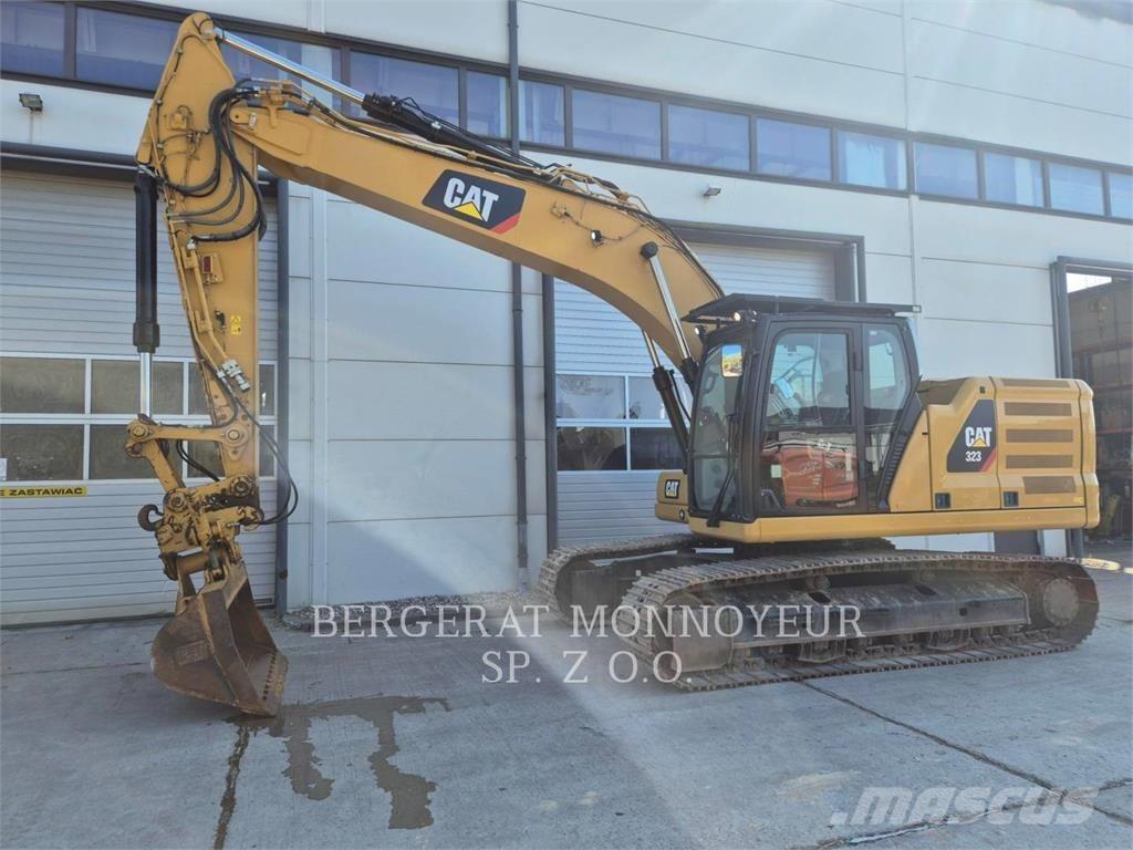 CAT 323 Гусеничні екскаватори