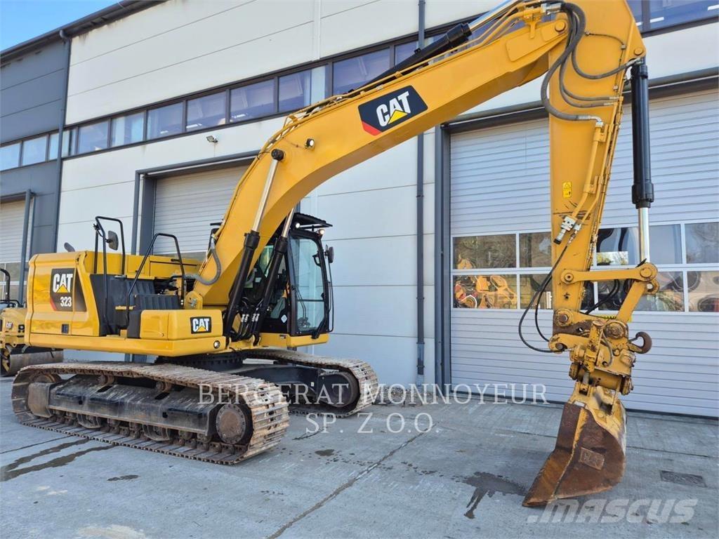 CAT 323 Гусеничні екскаватори