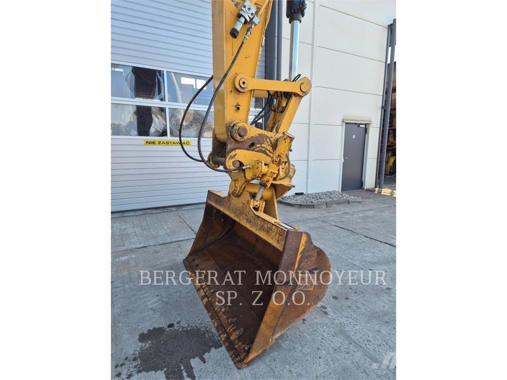 CAT 323 Гусеничні екскаватори