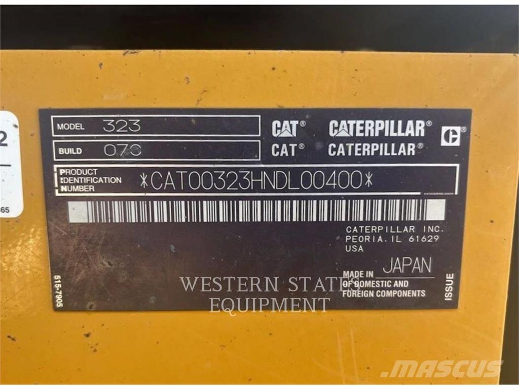 CAT 323 Гусеничні екскаватори