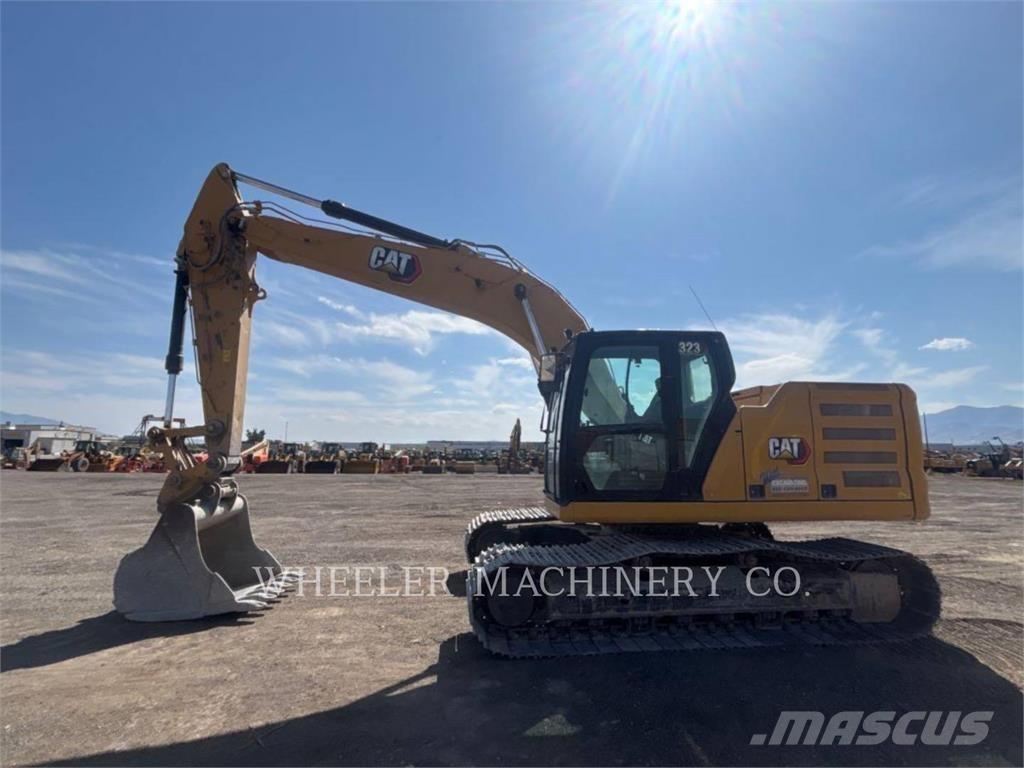 CAT 323 Гусеничні екскаватори