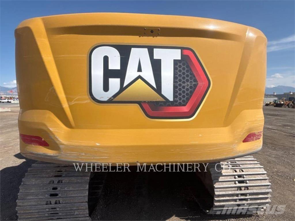 CAT 323 Гусеничні екскаватори