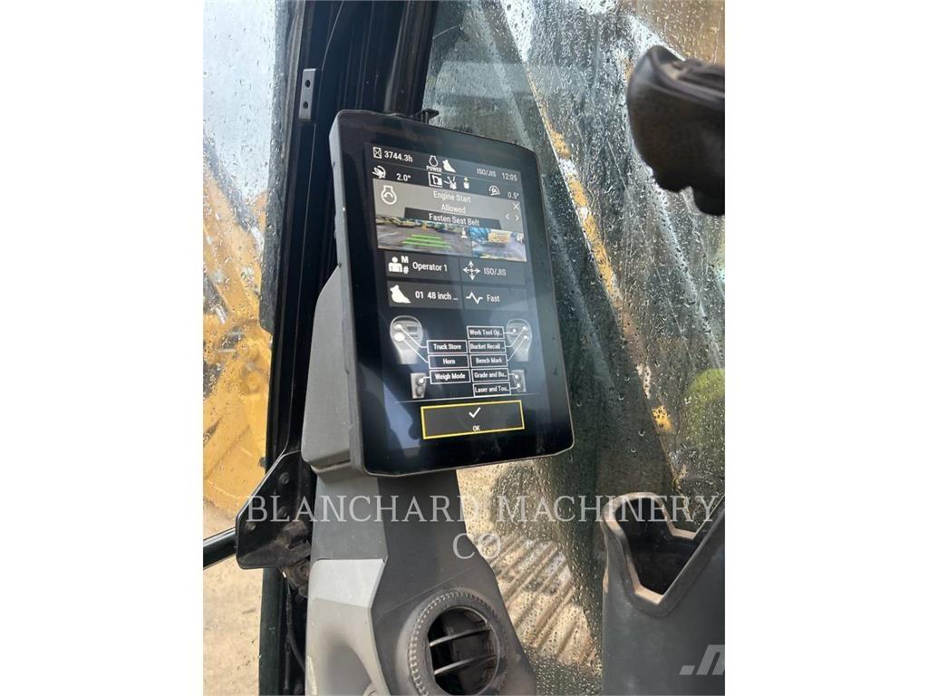 CAT 323 Гусеничні екскаватори