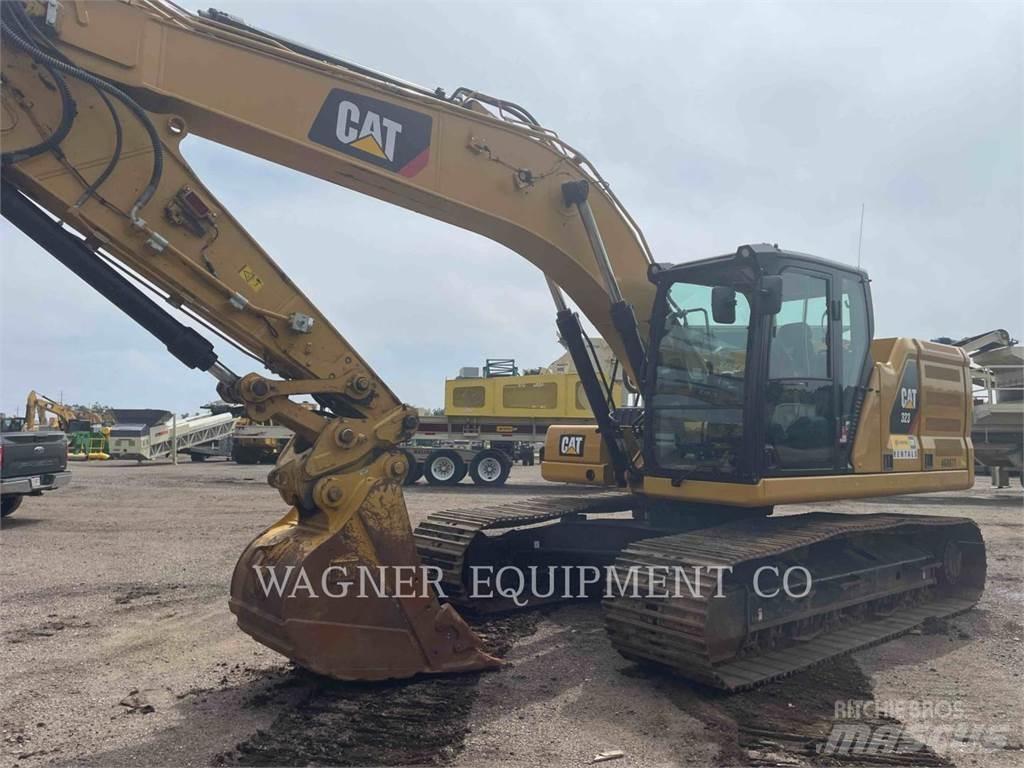 CAT 323 Гусеничні екскаватори