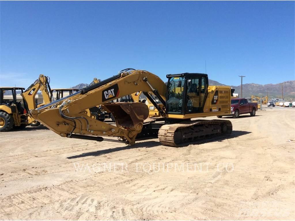 CAT 323 Гусеничні екскаватори