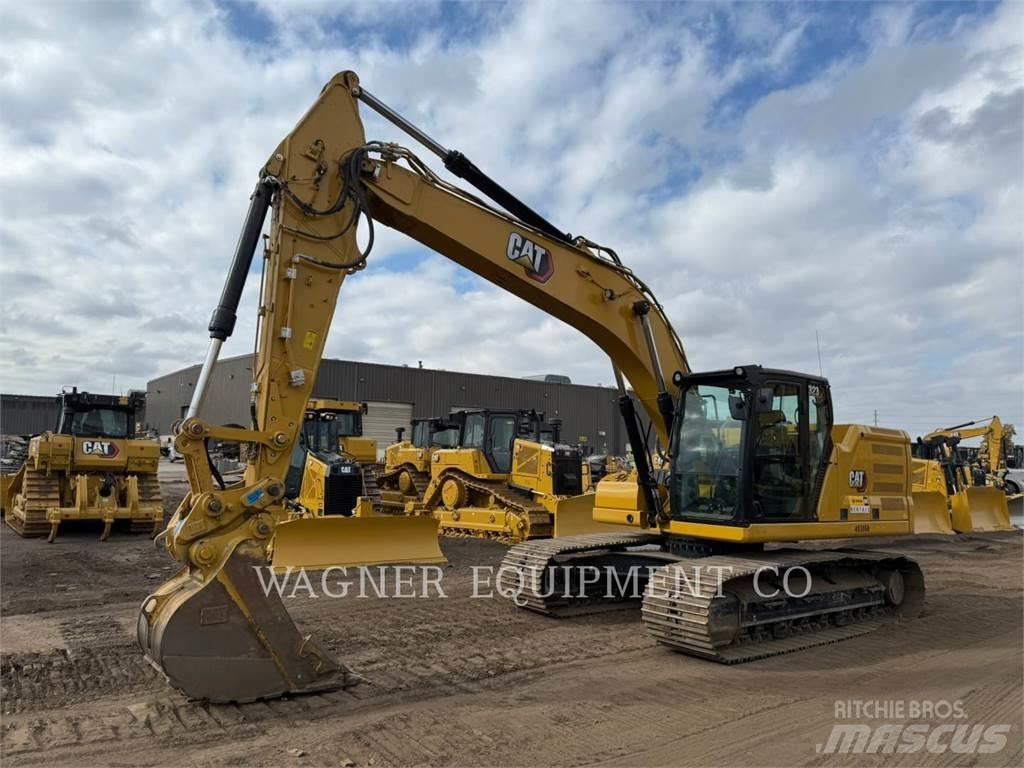 CAT 323 Гусеничні екскаватори
