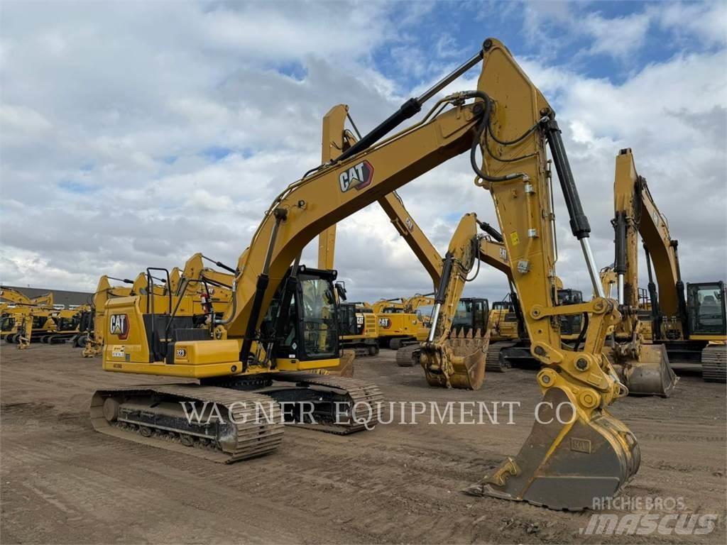 CAT 323 Гусеничні екскаватори