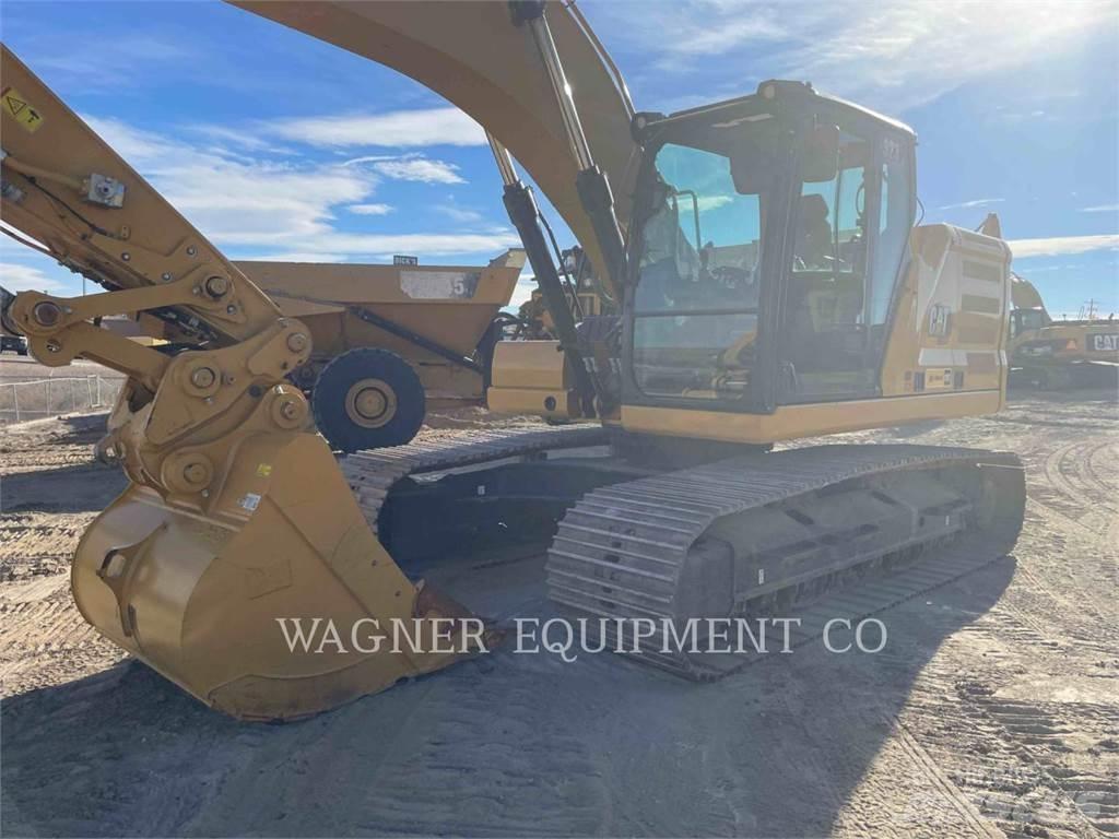 CAT 323 Гусеничні екскаватори