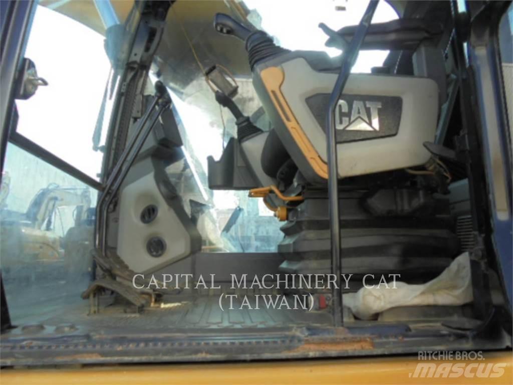 CAT 323-07 Гусеничні екскаватори