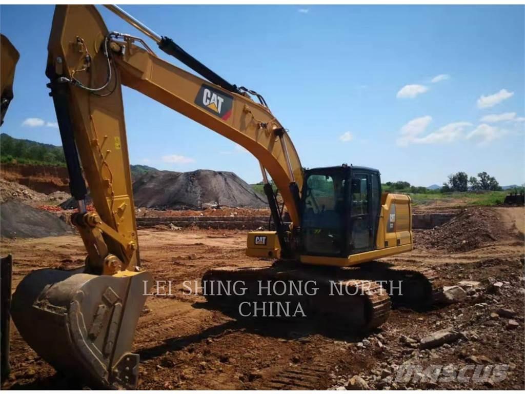 CAT 323-07 Гусеничні екскаватори