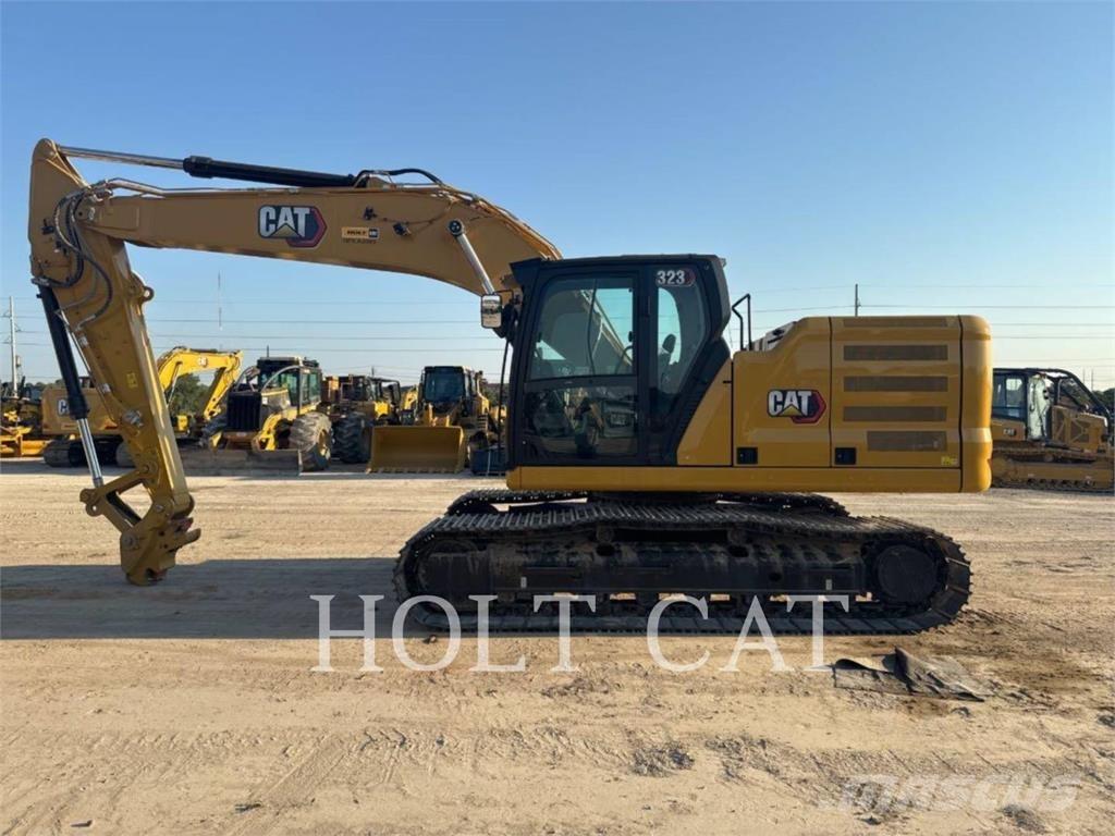 CAT 323 TC Фронтальні навантажувачі
