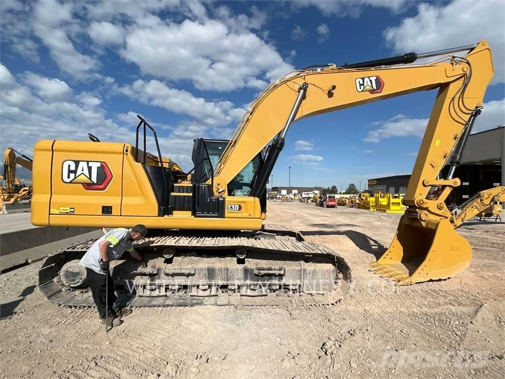 CAT 330 Гусеничні екскаватори