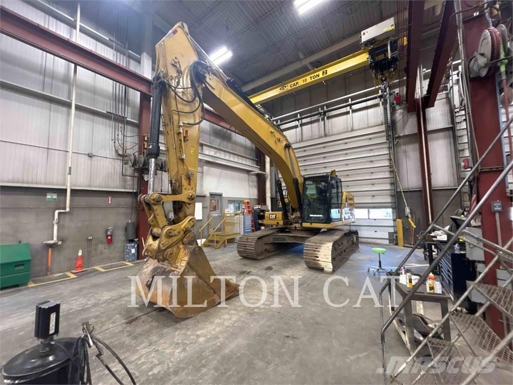 CAT 330 Гусеничні екскаватори