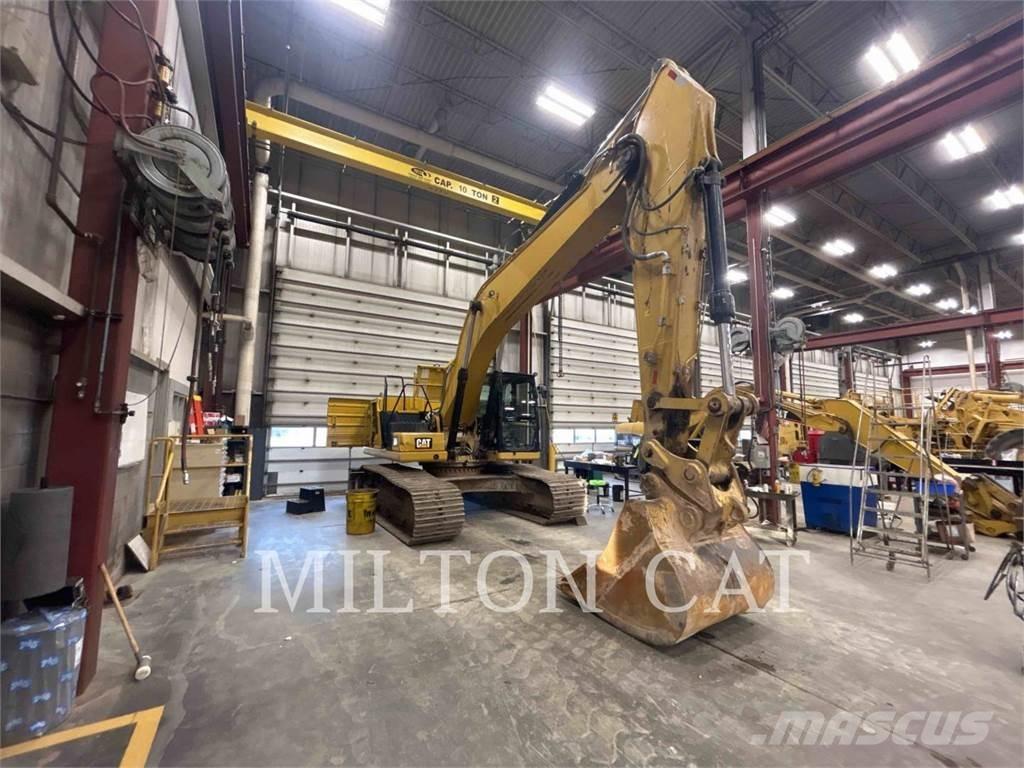 CAT 330 Гусеничні екскаватори