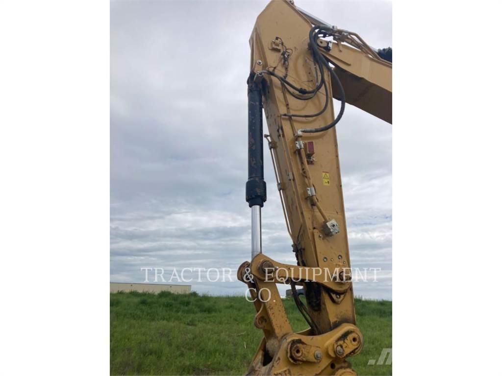 CAT 330 Гусеничні екскаватори