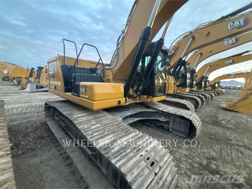 CAT 330 TH Гусеничні екскаватори