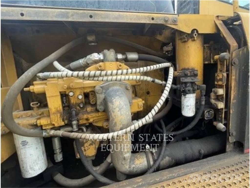 CAT 330B FM Лісогосподарські трактори