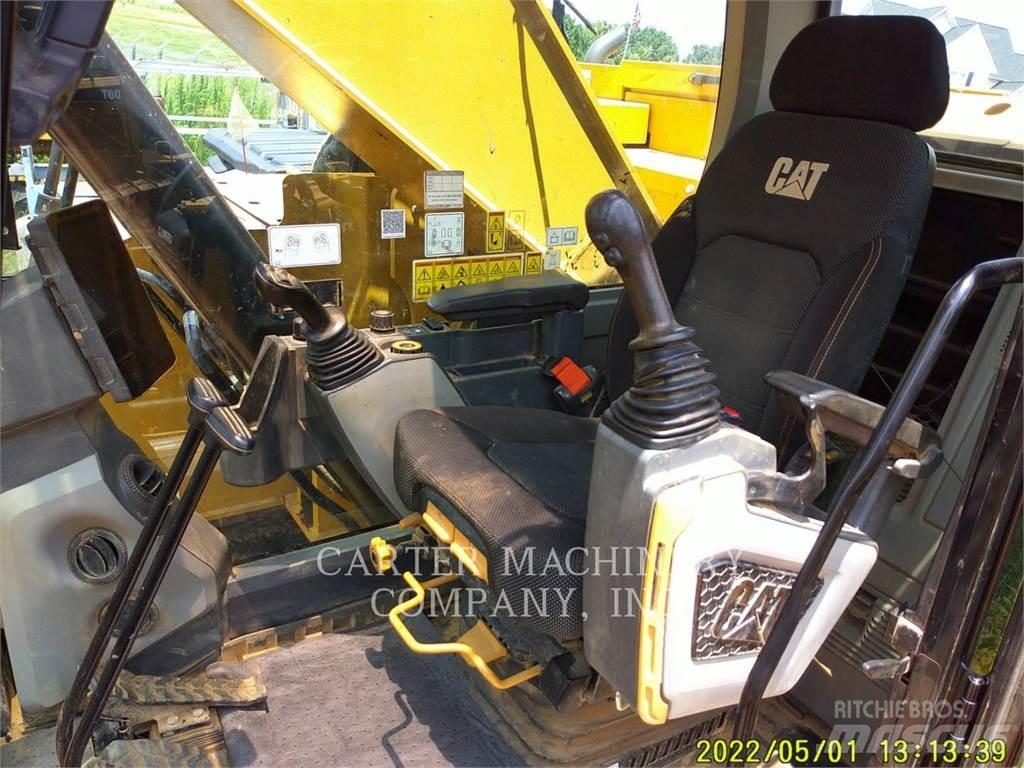 CAT 335 Гусеничні екскаватори