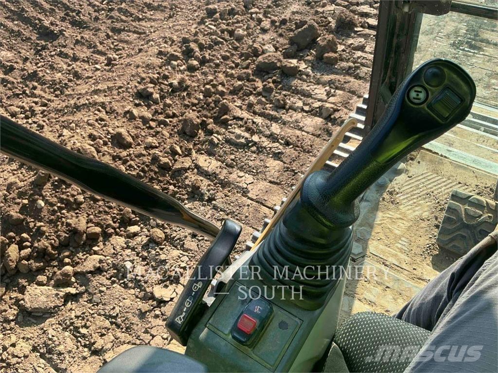 CAT 340 Гусеничні екскаватори