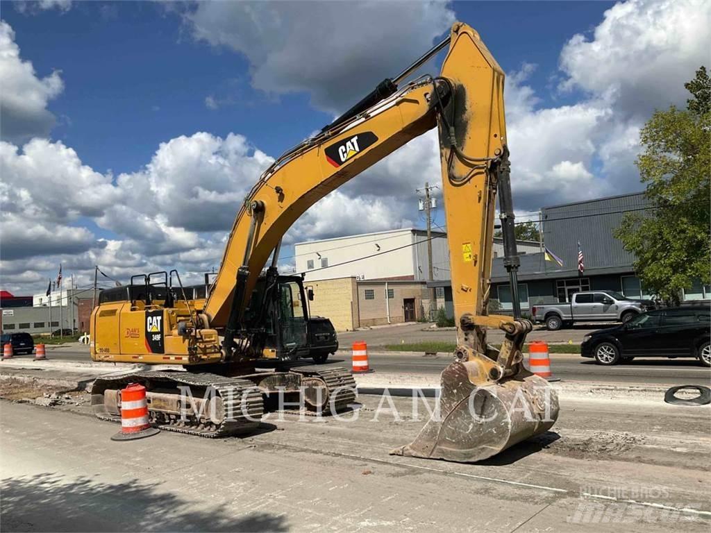 CAT 349FL + Гусеничні екскаватори