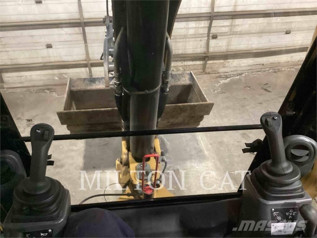 CAT 420 Екскаватори-навантажувачі
