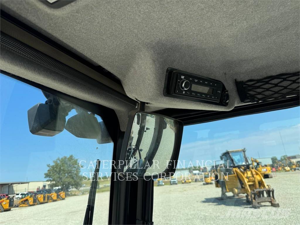 CAT 42007 Екскаватори-навантажувачі