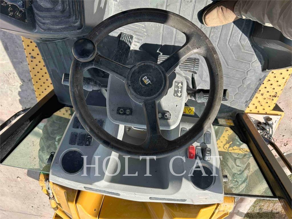 CAT 42007 Екскаватори-навантажувачі