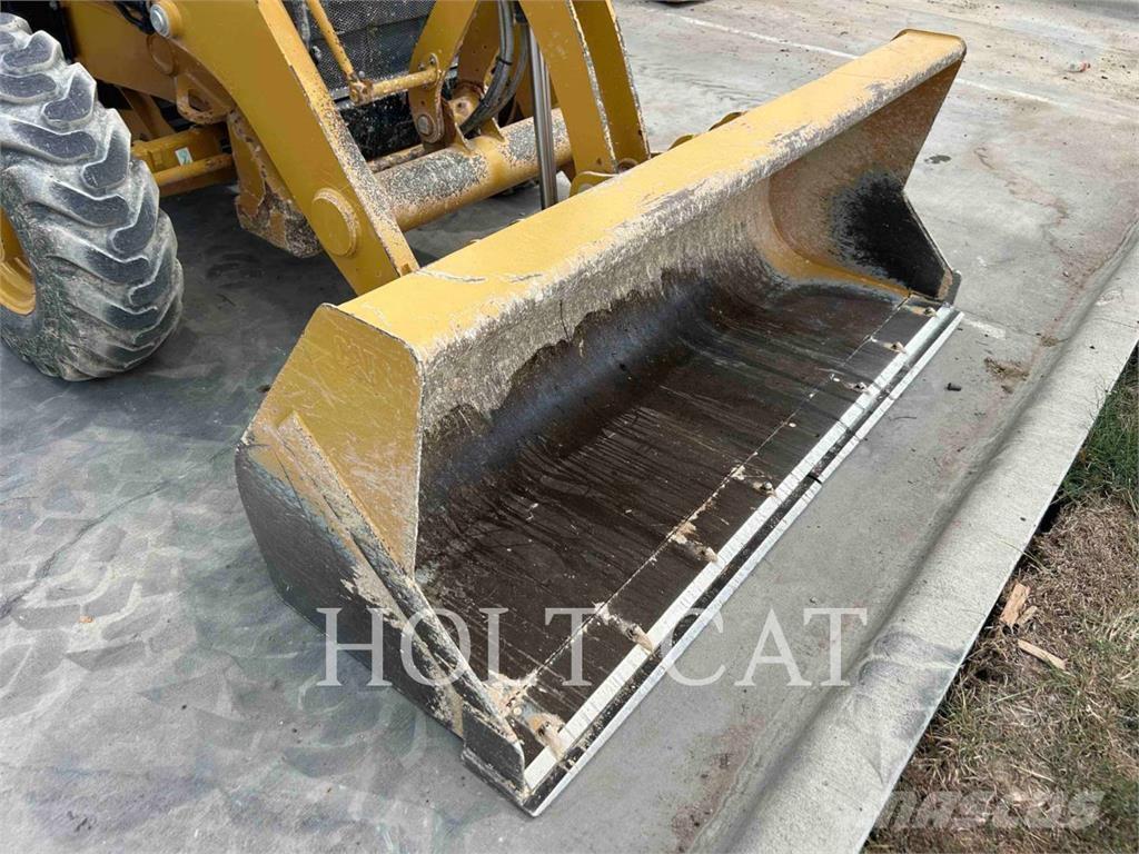 CAT 42007 Екскаватори-навантажувачі