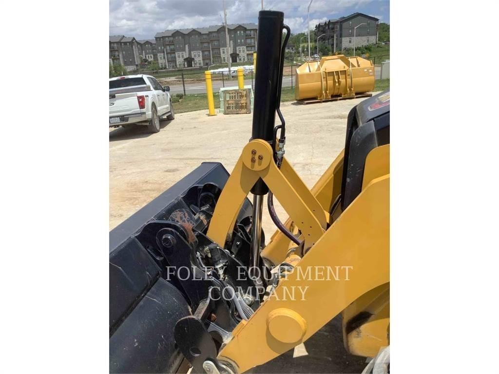 CAT 42007XE Екскаватори-навантажувачі