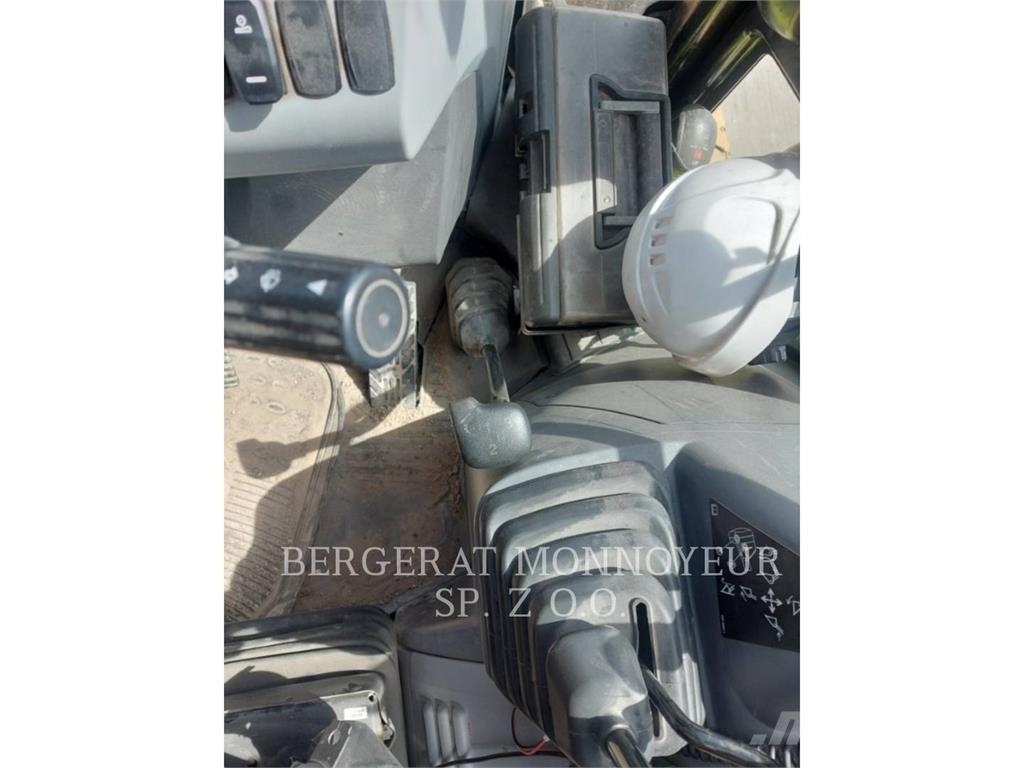 CAT 428 Екскаватори-навантажувачі