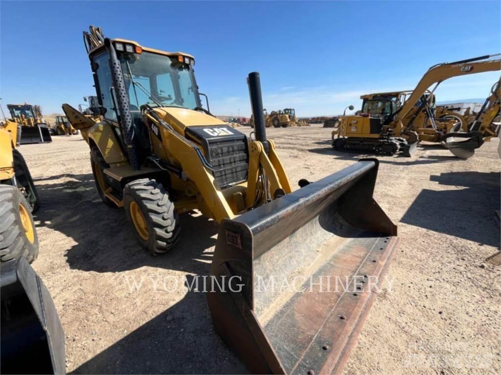 CAT 440 Екскаватори-навантажувачі