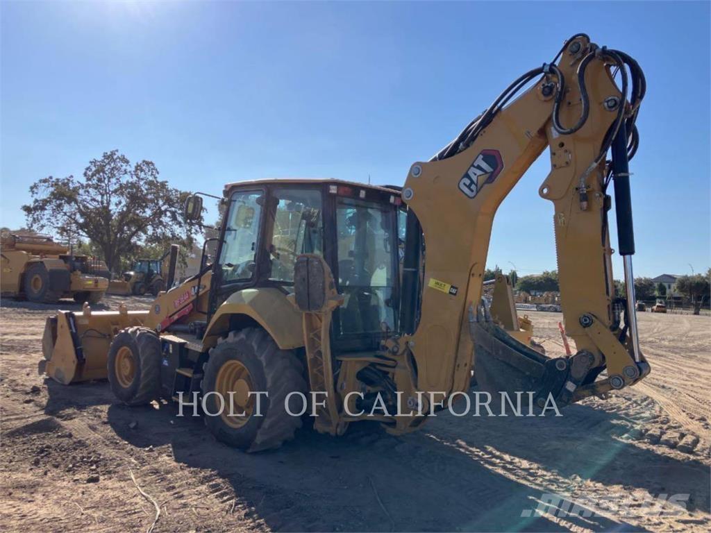 CAT 440 Екскаватори-навантажувачі