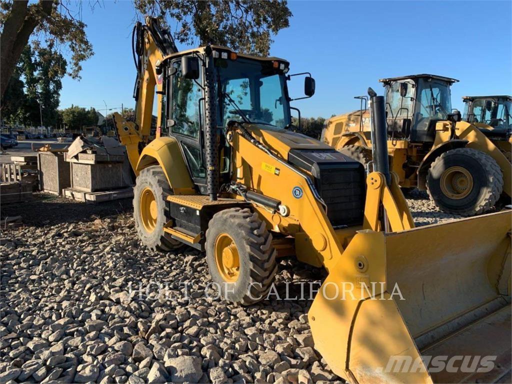 CAT 440 Екскаватори-навантажувачі