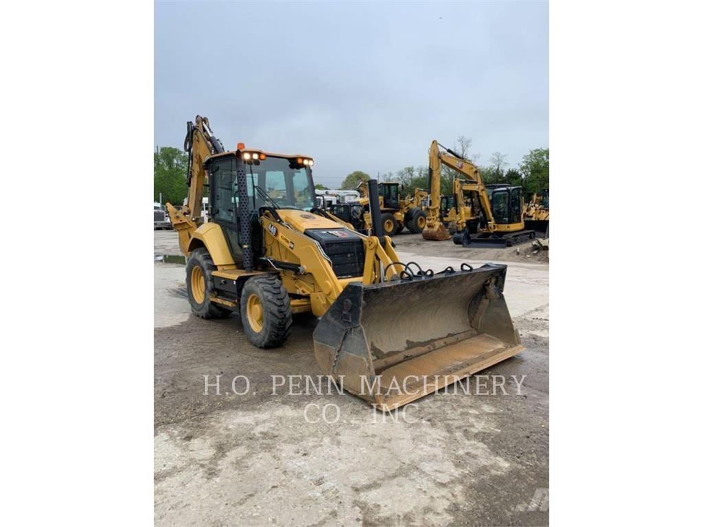 CAT 440-07 Екскаватори-навантажувачі