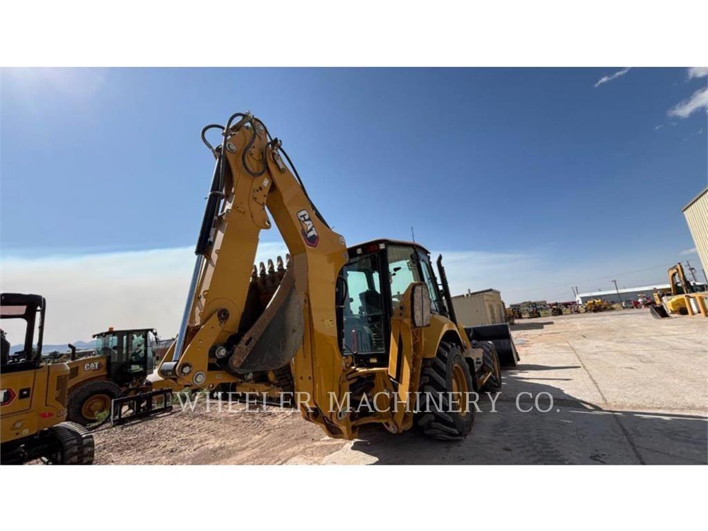 CAT 440 IT Екскаватори-навантажувачі