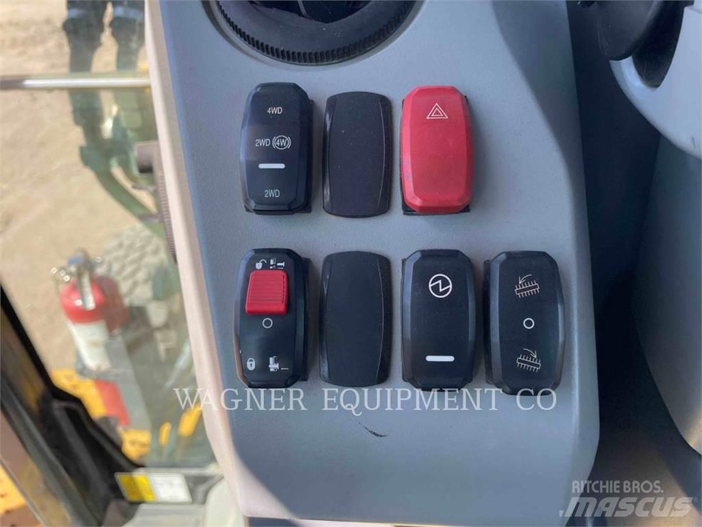 CAT 450 IT Екскаватори-навантажувачі