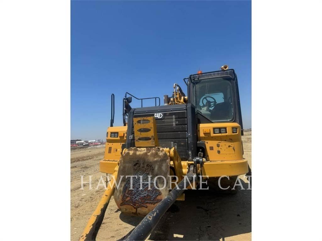 CAT 657 Скрепери
