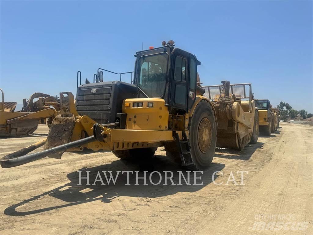 CAT 657 Скрепери